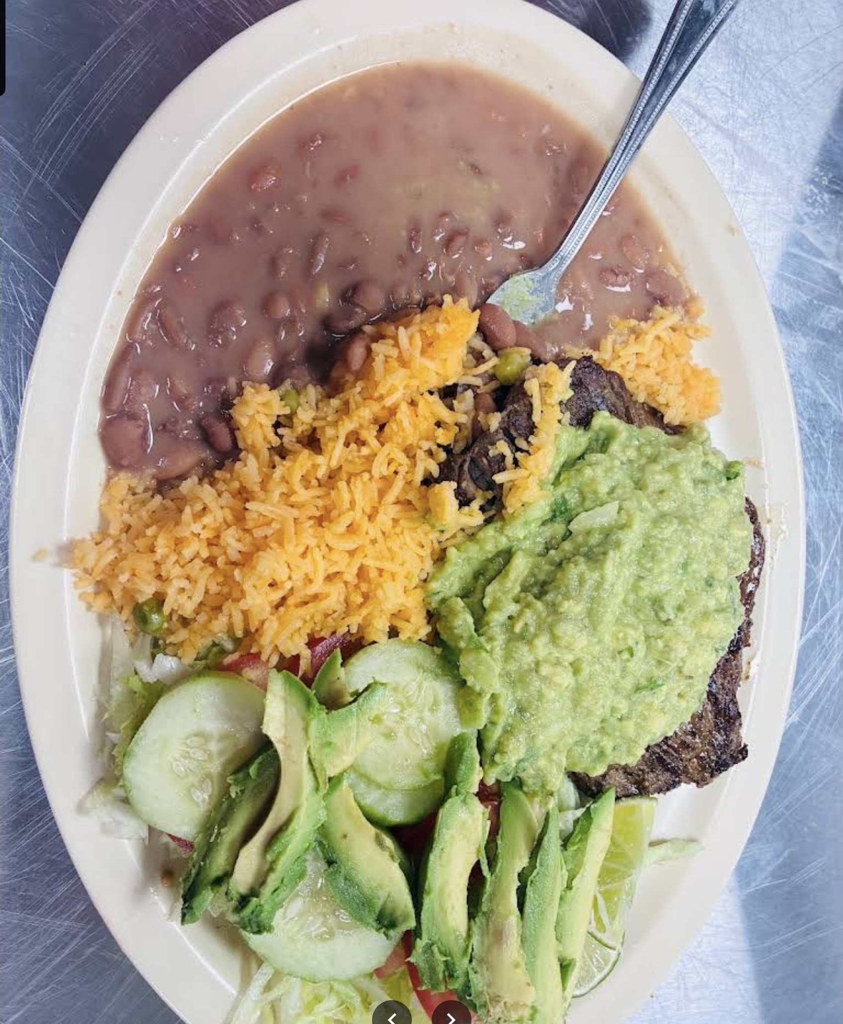 Carne asada plate with rice and beans